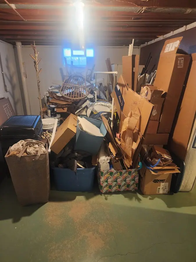 Roll-off dumpster container at job site for 8 Yard Dumpster Rental in Maiden